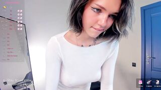 blue_eye_twinkle -Young woman in clothes poses in front of the camera and masturbates with a vibrator