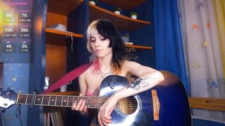 deliaderrick - A young naked girl chatting in front of the camera and playing the guitar.