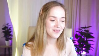 a_m_e_l_i_a - Clothed student girl teases in front of the camera