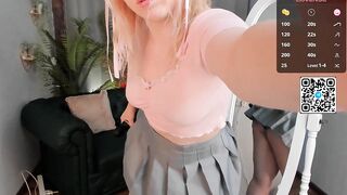 angel_ame - A young woman in a skirt teases in front of the camera and is embarrassed to undress in front of the camera