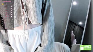 taitfollin - A young woman with clothes on communicates and won't take her clothes off.