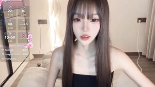 sunflowerbbb Charming Asian girl sweetly chatting and teasing in front of the camera