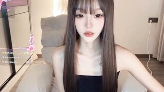 sunflowerbbb Charming Asian girl sweetly chatting and teasing in front of the camera