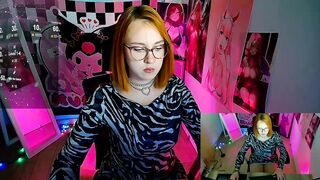 margaret_red - Young girl teasing in front of the camera and sweet-talking.