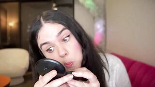 gia_is_horny -Clothed young woman teases in front of the camera and shows her sweet tits
